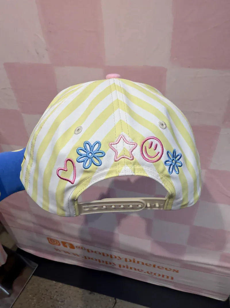 Poppy &amp; Pine trucker hat featuring the All Oopsies No Daisies design with a curved brim and adjustable strap.