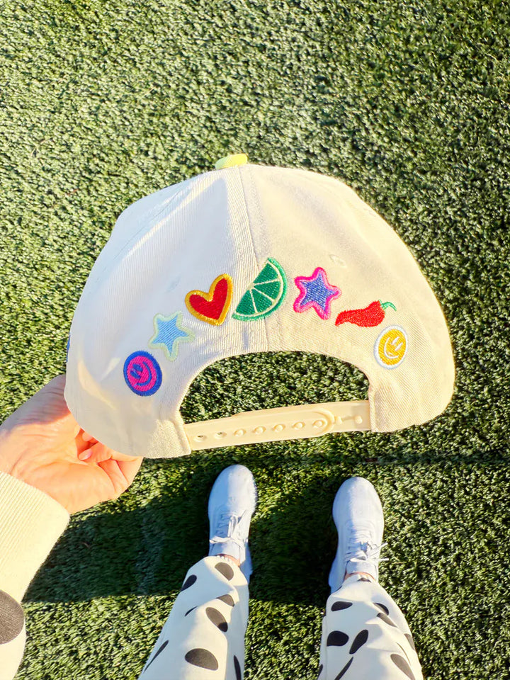 Poppy &amp; Pine Make It Spicy Margs trucker hat with a colorful design and adjustable mesh back for casual style.