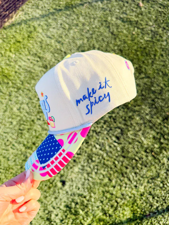 Poppy &amp; Pine Make It Spicy Margs trucker hat with a colorful embroidered design on the front.