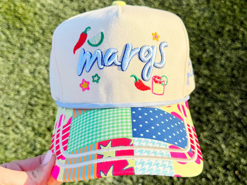 Poppy & Pine Make It Spicy Margs trucker hat with colorful embroidered design and mesh back for casual sun protection.