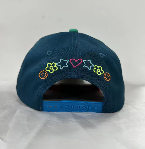 Poppy &amp; Pine adult trucker hat featuring a casual part-time adult hat design with mesh back and adjustable snap closure.