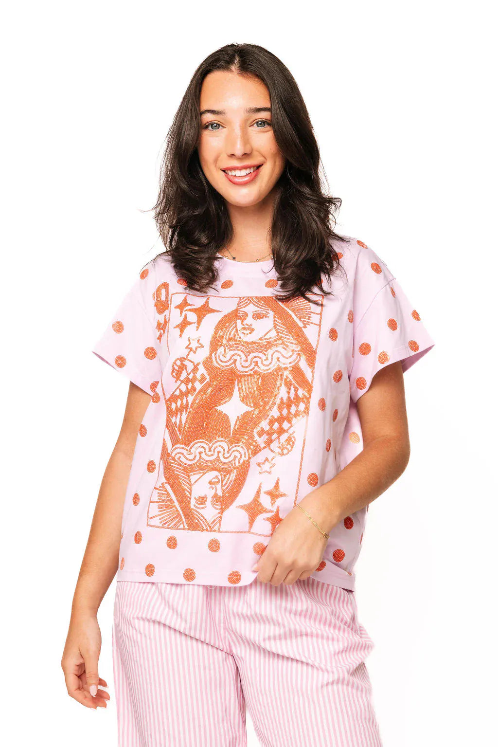 Pink and orange polka dot Queen of Sparkles logo tee for women, featuring a casual fit and playful design.
