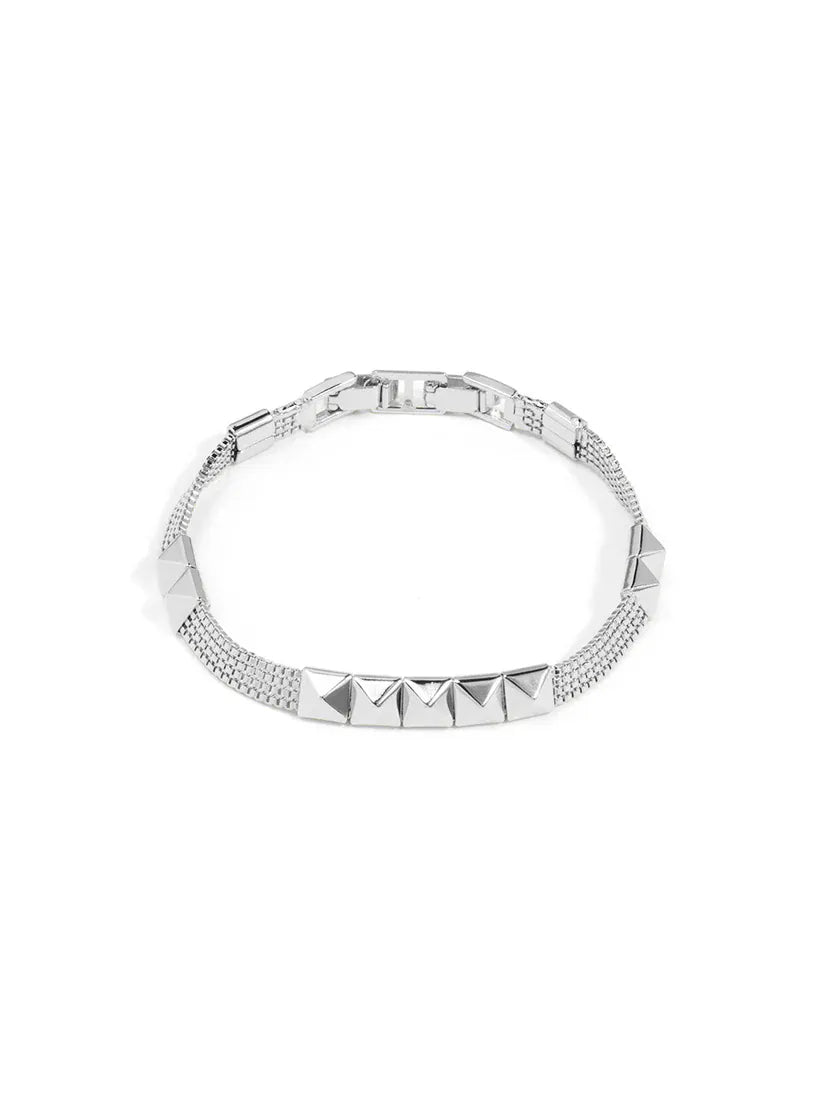 RHO Jewelry studded mesh bracelet featuring metal studs and a sleek, modern design on a black background.
