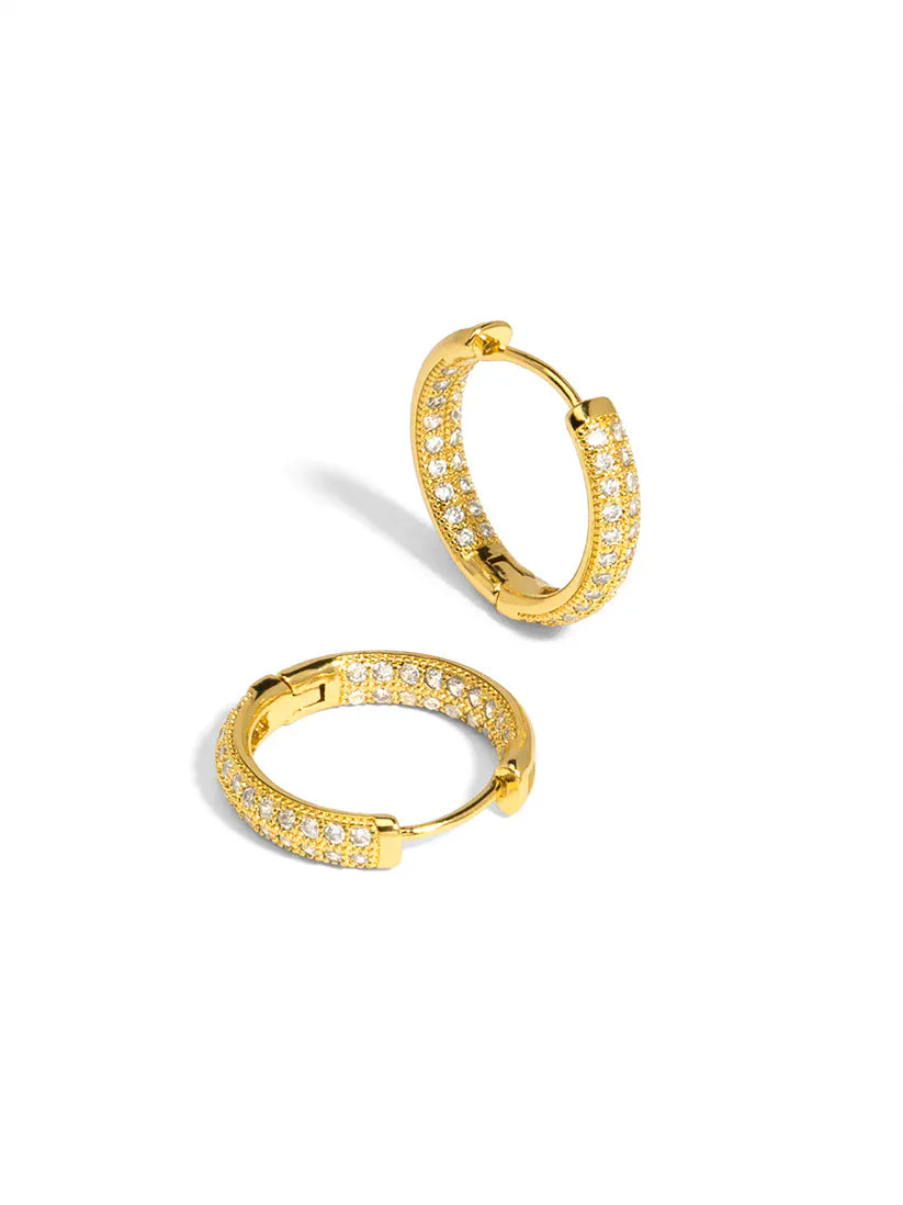Gold Pav≈Ω Round Huggies earrings by RHO Jewelry featuring sleek, circular hoop design perfect for everyday wear.