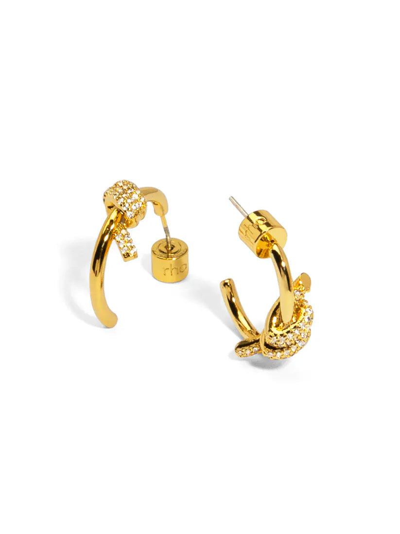 RHO Jewelry pave knotted small hoop earring featuring sparkling, intricate design in shiny metal with a secure clasp.