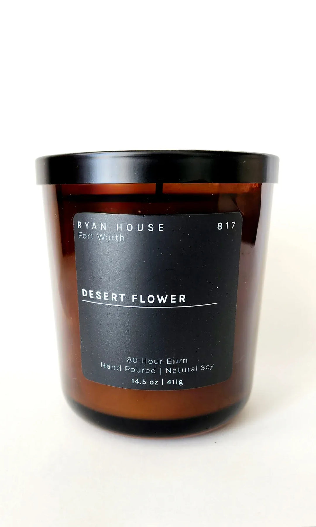 Ryan House Candles Desert Flower candle with a white ceramic holder and floral design, perfect for home decor and cozy ambiance.