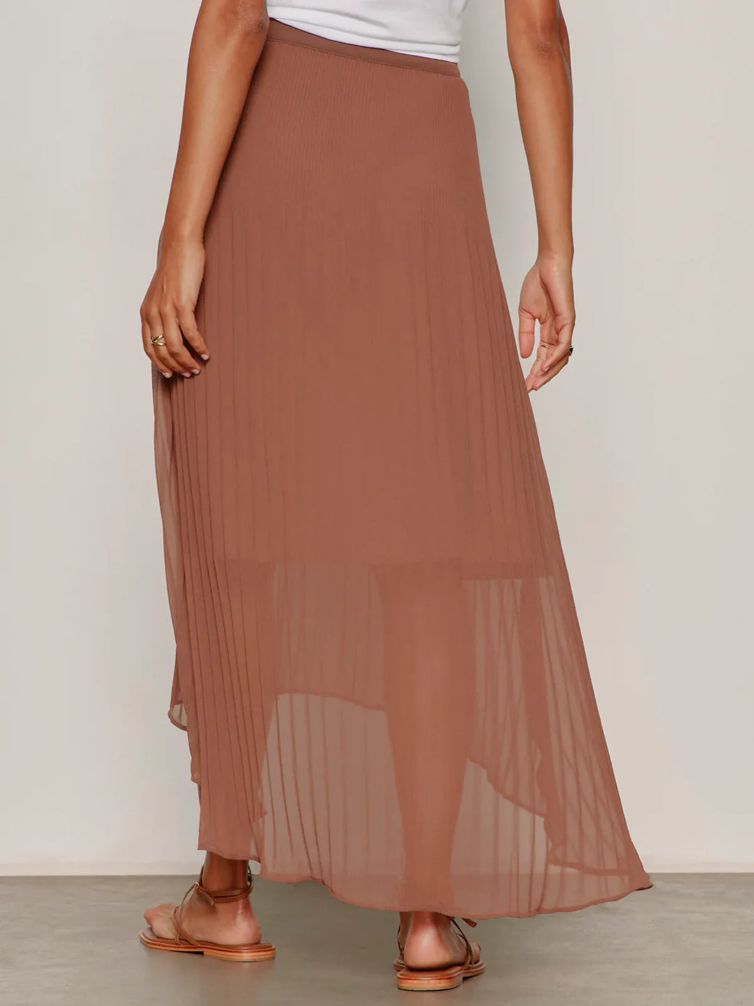 Sanctuary Meant To Be Pleated Midi Skirt in flowy fabric with a high waist and pleated design, perfect for stylish everyday wear.