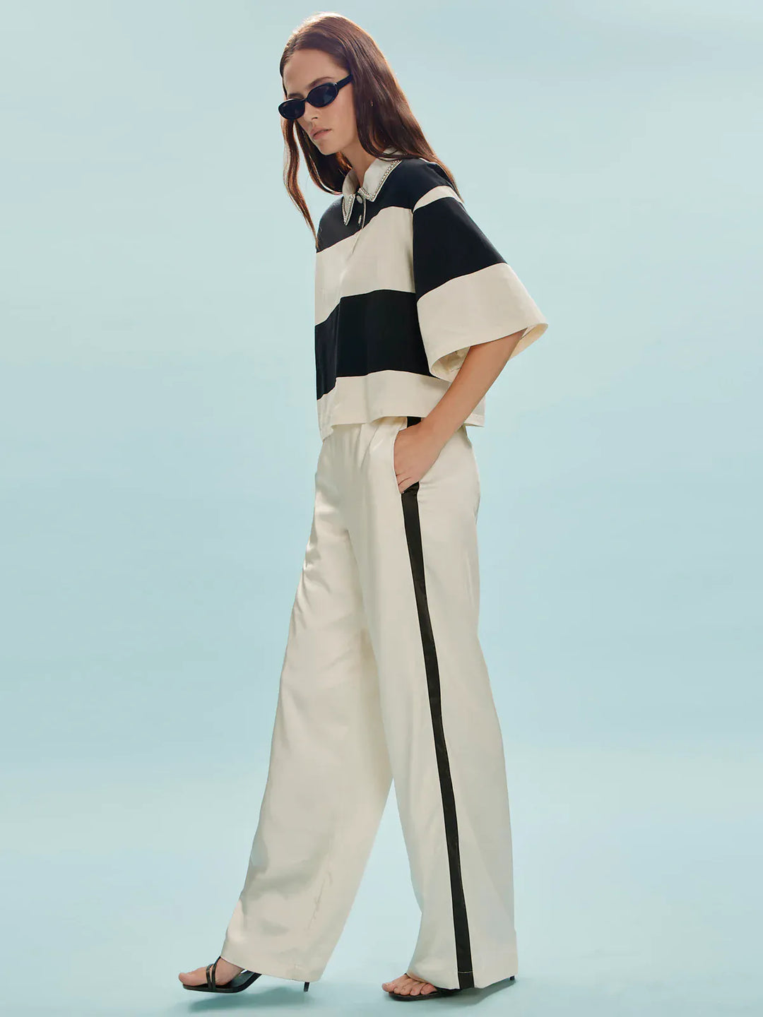 Sanctuary Angel Satin Track Pant showing sleek satin fabric and relaxed fit, designed for comfortable, stylish casual wear.