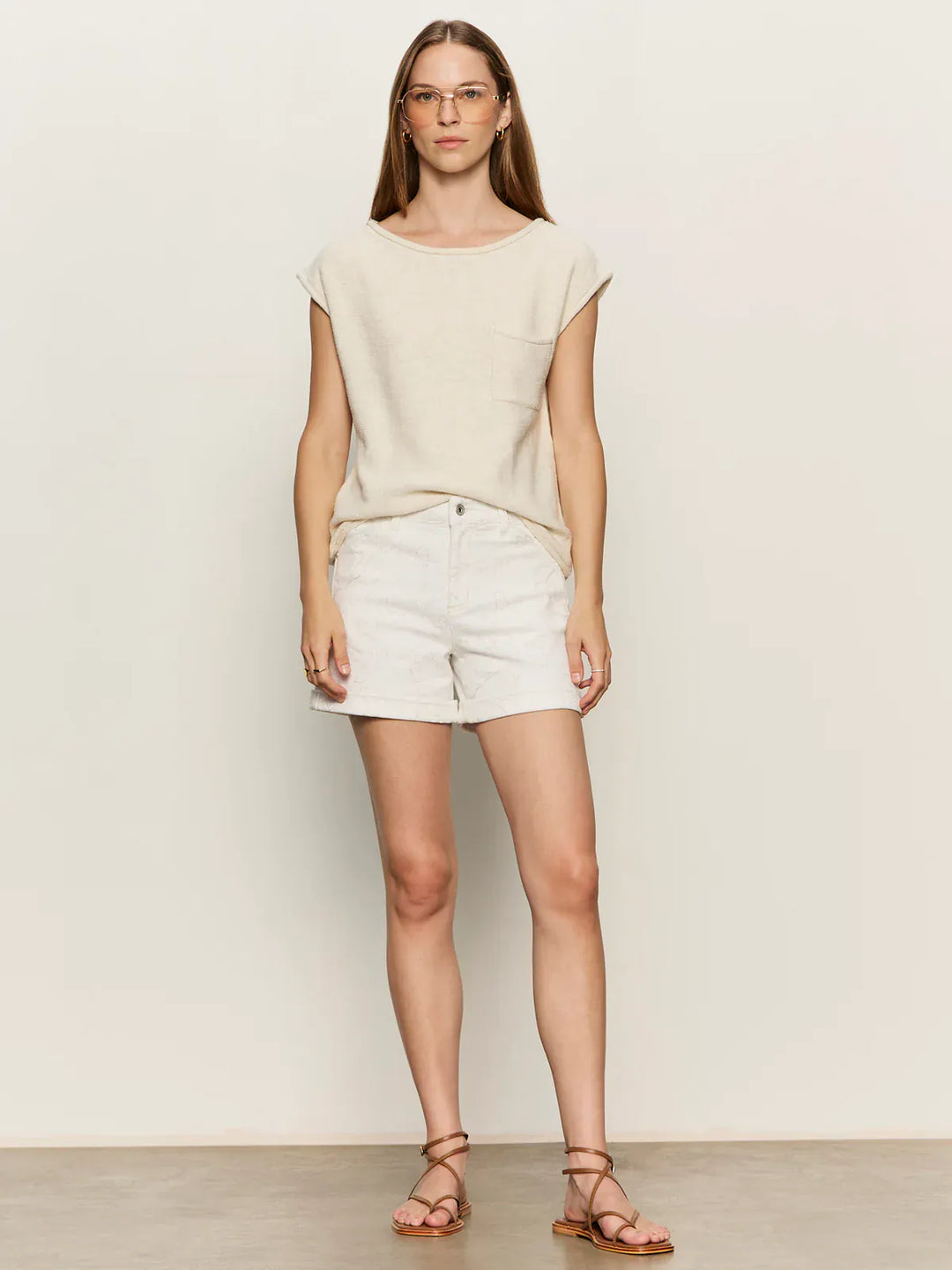 Sanctuary Impact Denim Shorts featuring a classic five-pocket design, distressed details, and frayed hems on light-wash denim.