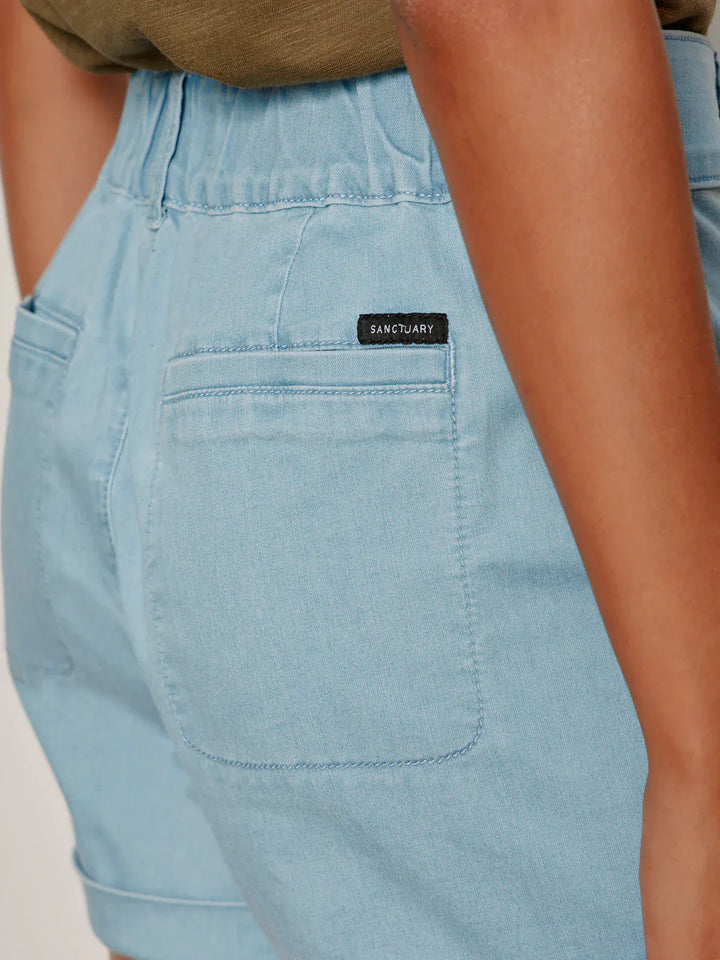 Sanctuary Wander On Shorts in neutral fabric, featuring a relaxed fit with adjustable drawstring waist and side pockets.