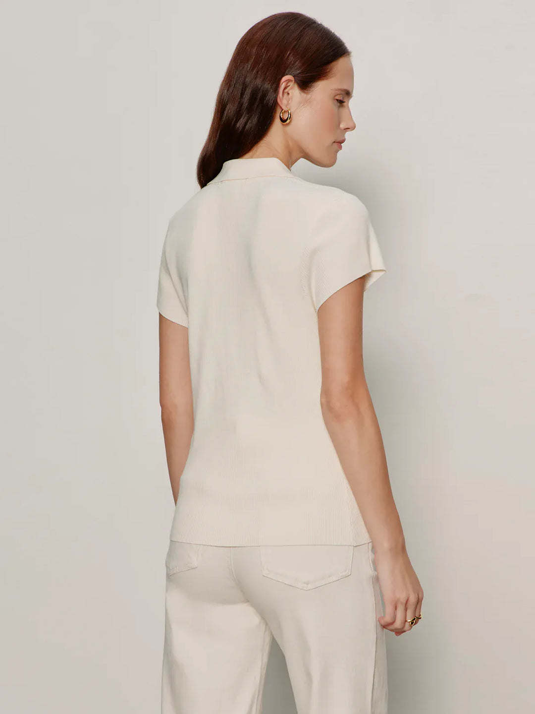 Sanctuary Lover Girl ribbed sweater top featuring a fitted design and soft knit fabric, displayed on a neutral background.
