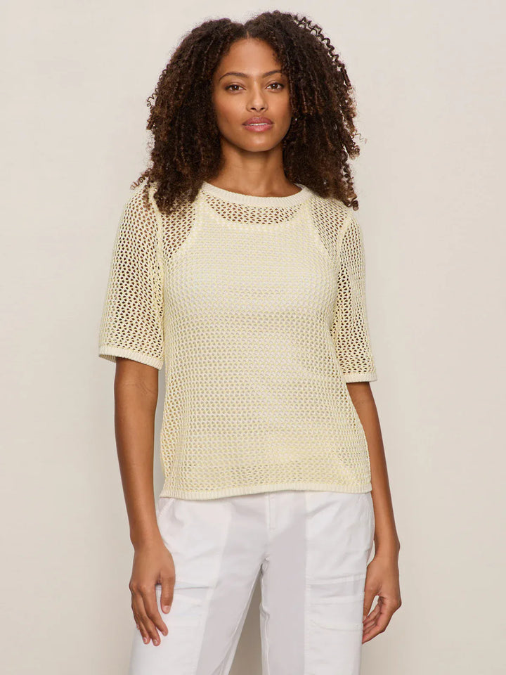 Sanctuary open knit sweater tee, a lightweight top with a relaxed fit and open-knit pattern, perfect for casual wear.