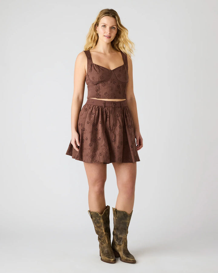 Steve Madden Vanny Mini Skirt in walnut color, slim fit with a stylish design, shown on a white background.