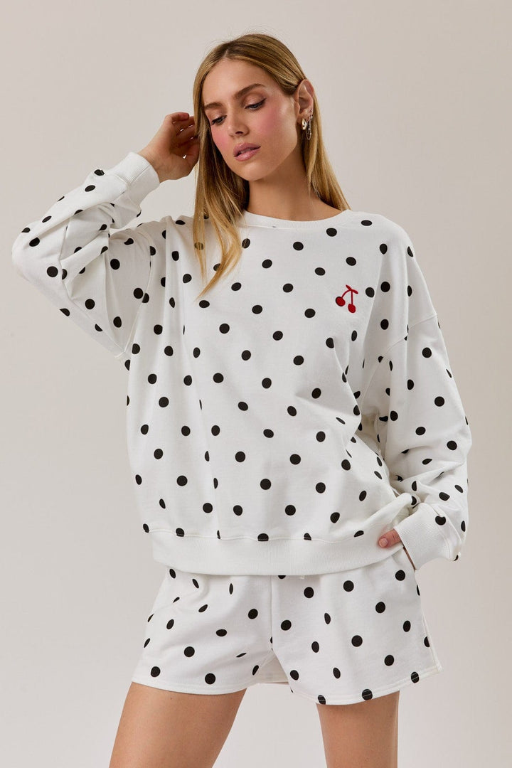 White and black polka dot sweatshirt from Sunday Edition&