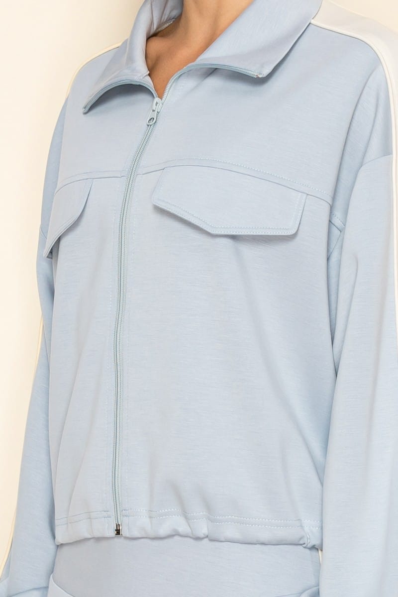 The Greii Journi Track Set featuring a stylish athletic jacket and matching pants in a sleek, modern design.