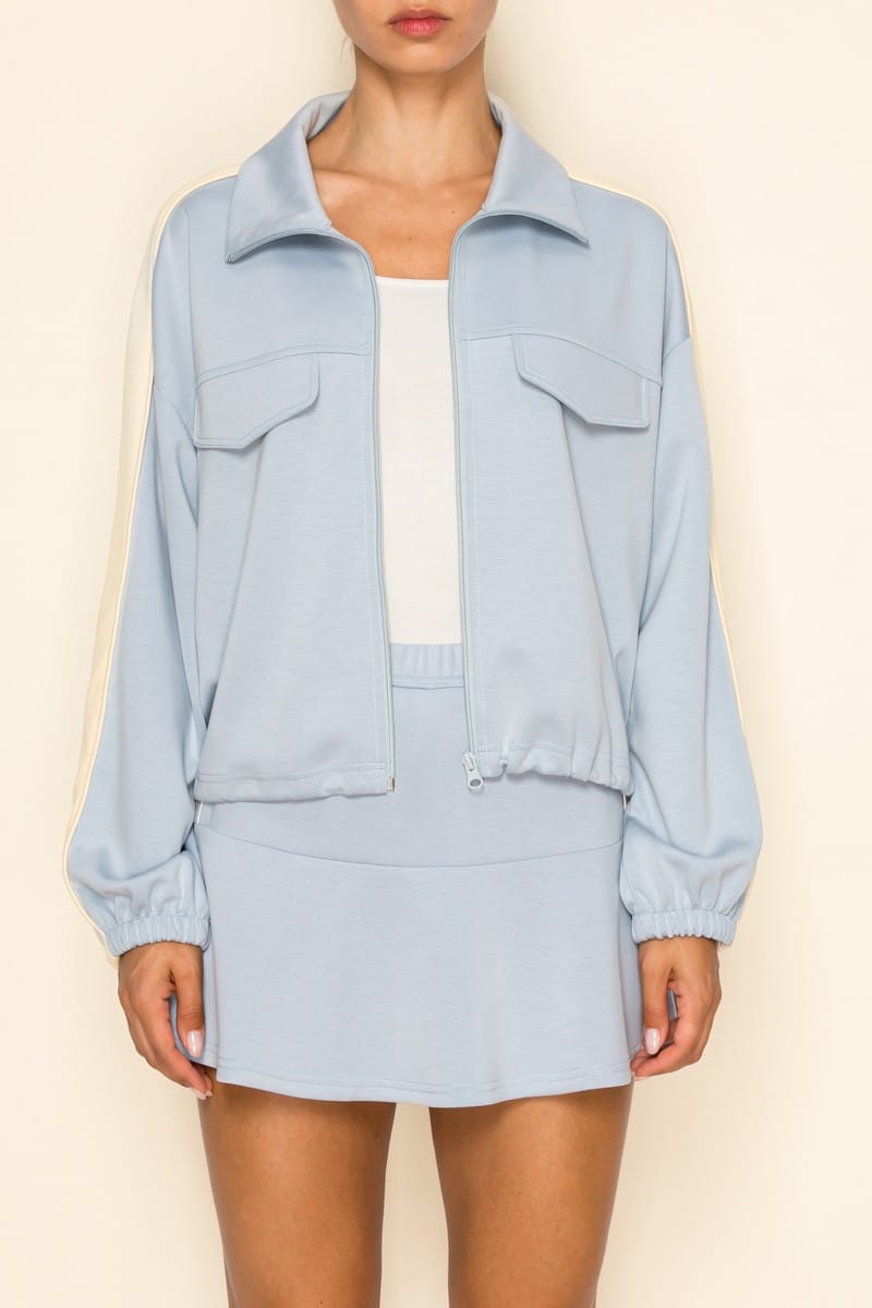 Sky blue Journi Track Set by The Greii, featuring a stylish matching jacket and pants designed for comfort and activewear.