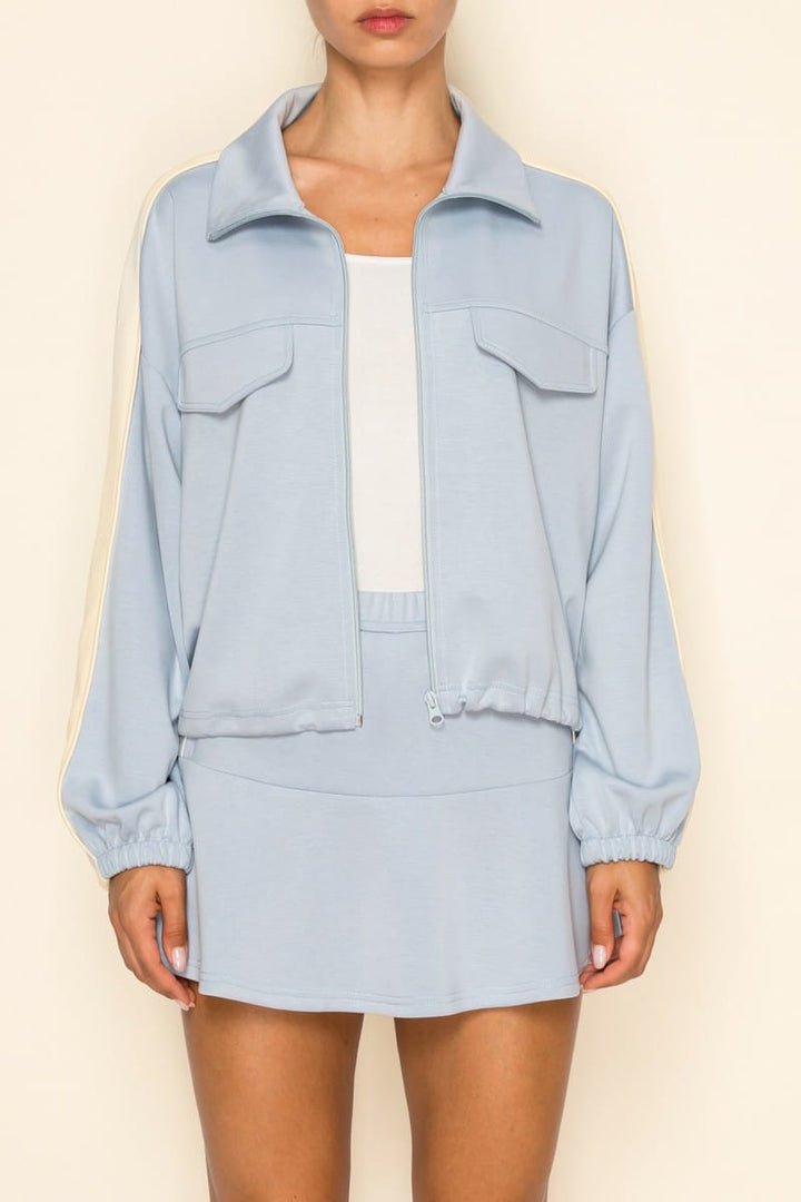 Sky blue Journi Track Set by The Greii, featuring a stylish matching jacket and pants designed for comfort and activewear.