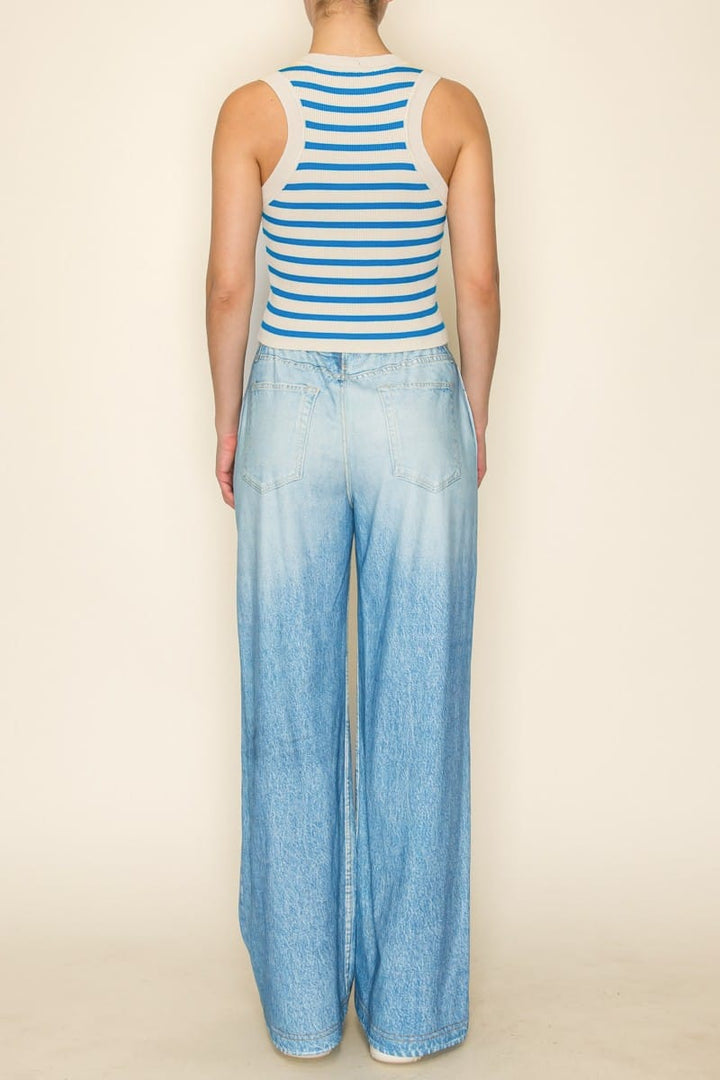 Celia striped tank top by The Greii featuring a fitted design with bold horizontal stripes in various colors.