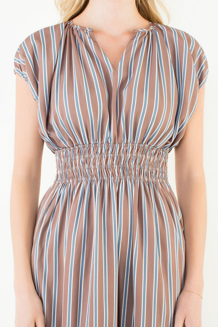 THML Arya striped dress featuring a relaxed fit and bold pattern, perfect for casual or summer wear.