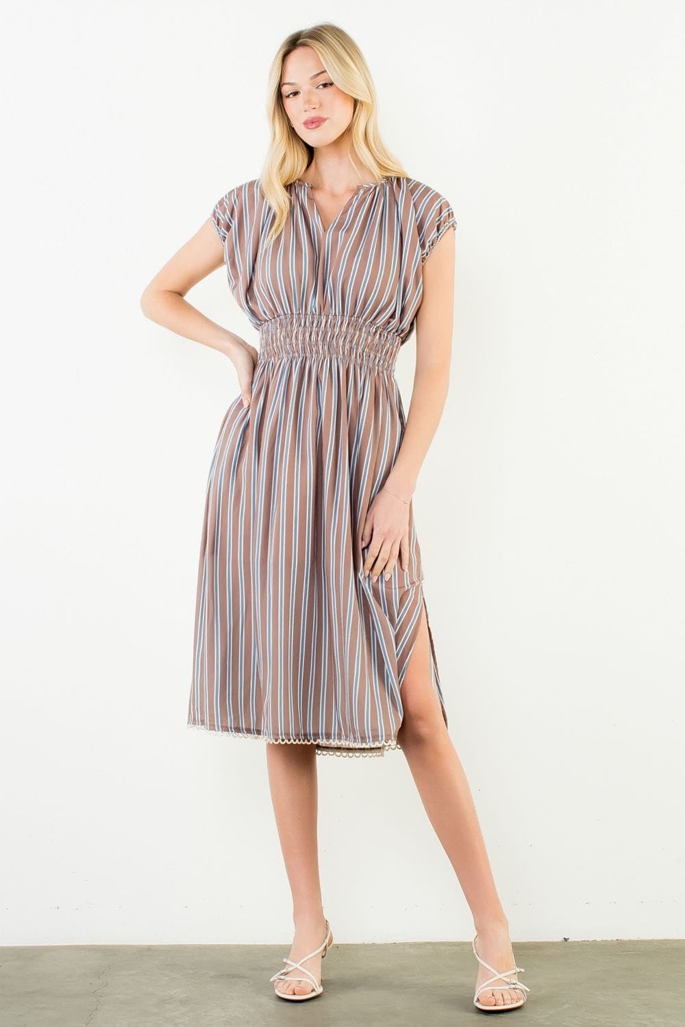 Arya striped dress by THML featuring a casual fit with blue, white, and pink stripes perfect for summer wear.
