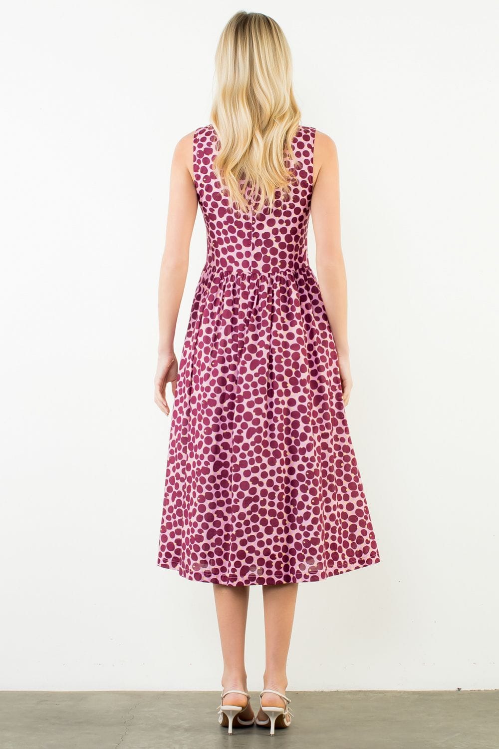 THML Wrenley Dots Midi Dress showing a stylish midi dress with a dotted pattern and flowing silhouette.