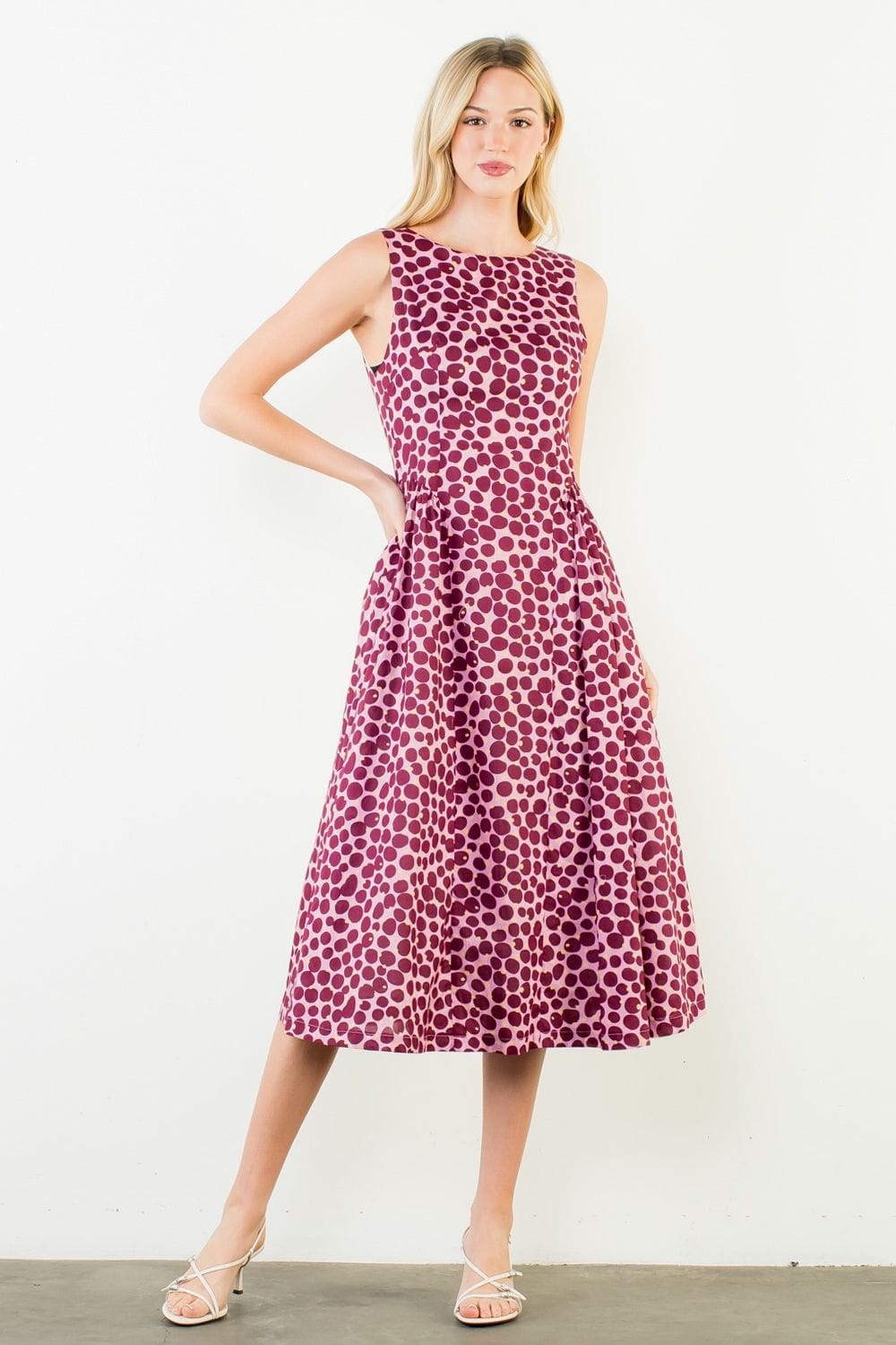 THML Wrenley Dots Midi Dress showcasing a stylish midi dress with a dotted pattern, perfect for casual or semi-formal occasions.
