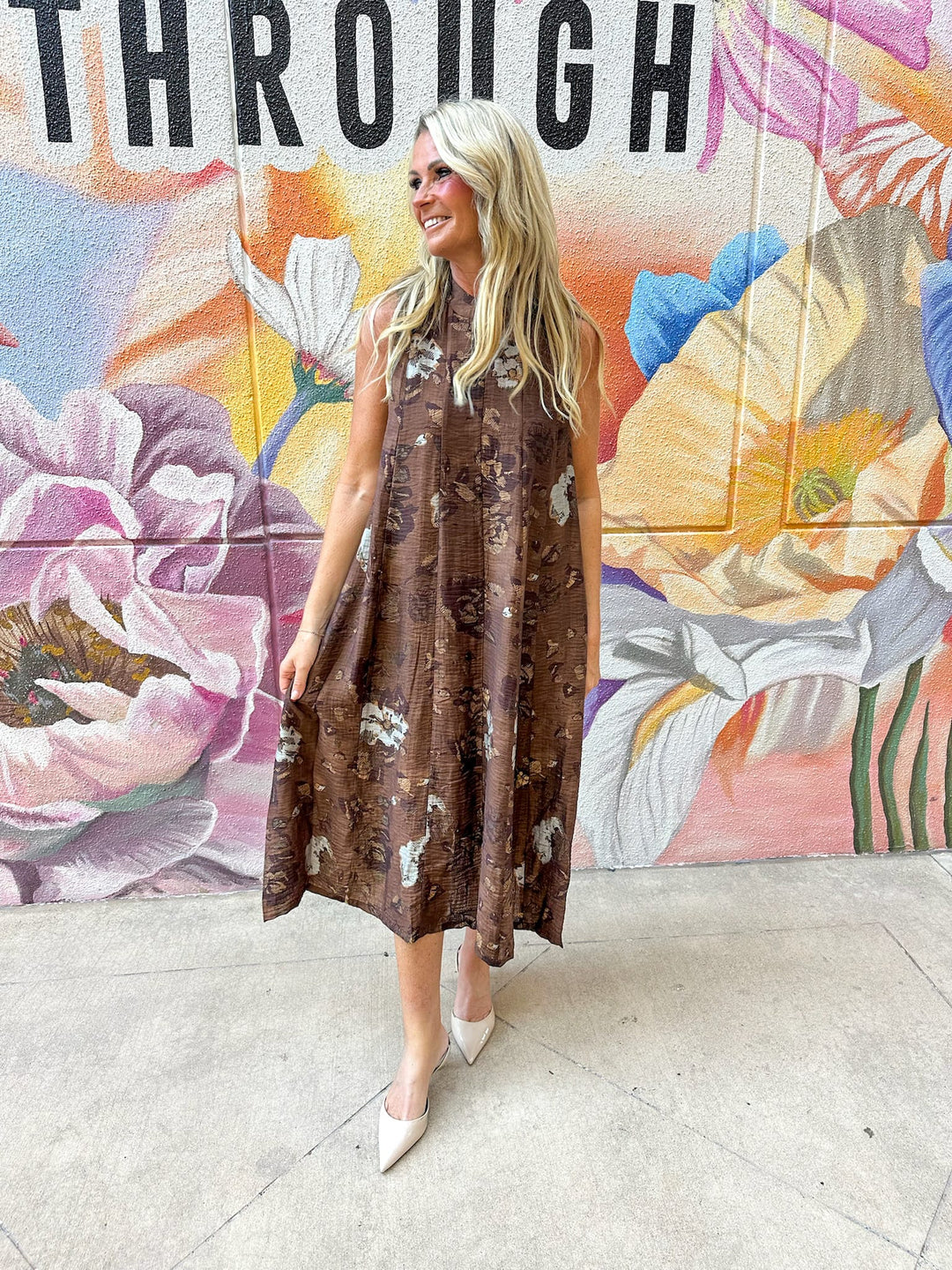 THML Kinsley Tie Back Floral Maxi Dress featuring a vibrant floral pattern and tie-back detail.