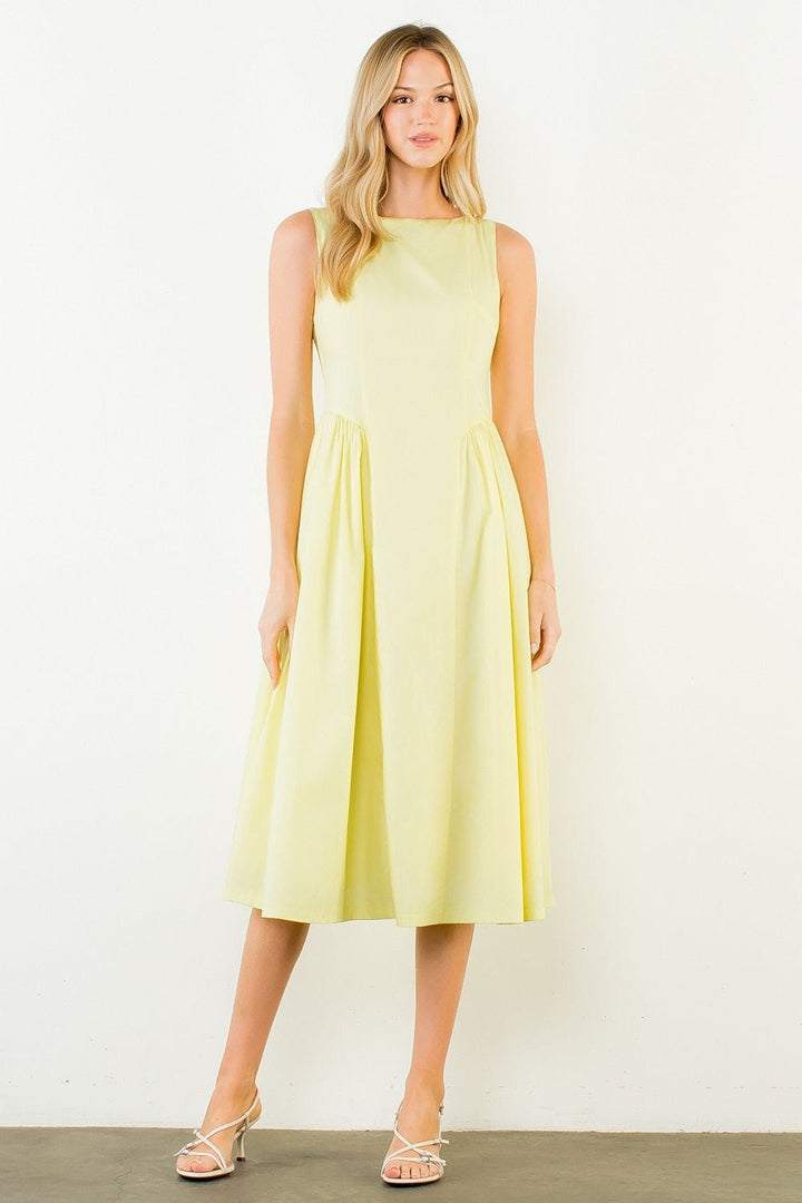 THML Carmen sleeveless midi dress featuring a flowing silhouette and intricate floral pattern, perfect for summer occasions.