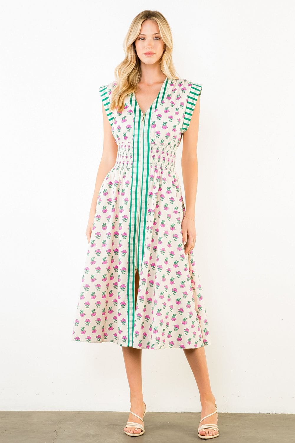Cream THML Bonnie smocked midi dress with a fitted bodice and flowing skirt, perfect for casual or semi-formal occasions.