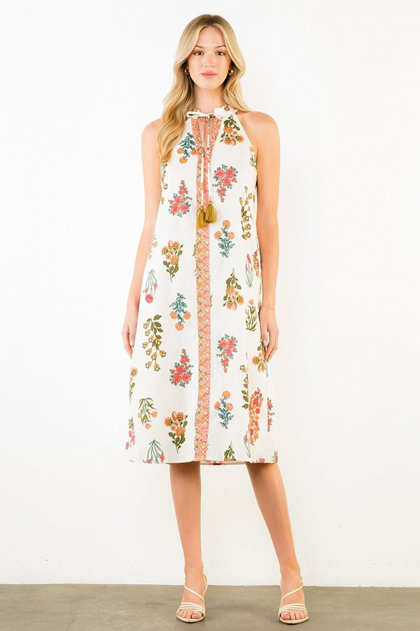 Cream Lana Floral Halter Midi Dress by THML, featuring a flowy midi length and floral print with halter neckline.