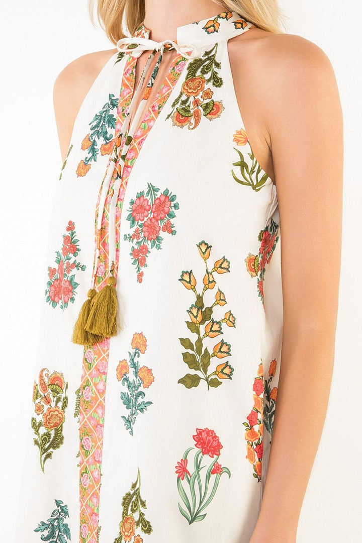 THML Lana floral halter midi dress featuring a vibrant floral pattern and a flattering halter neckline.
