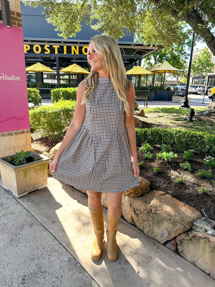 THML Mabel Gingham Short Midi Dress featuring a fitted bodice, short sleeves, and a classic gingham pattern.