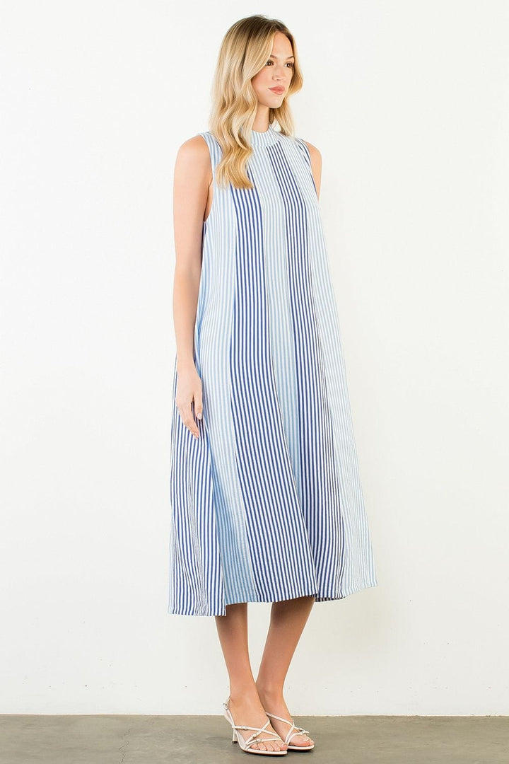 THML Raya striped midi dress featuring a stylish pattern and flowing silhouette, perfect for casual or semi-formal wear.