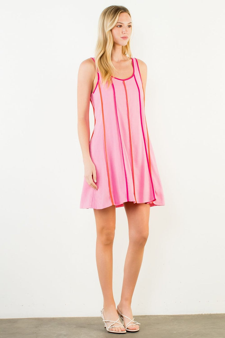 THML Milani striped mini dress featuring a fitted silhouette, short sleeves, and a vibrant, colorful pattern perfect for casual wear.