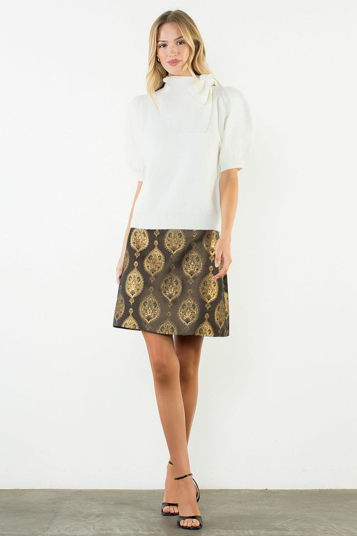 THML Lillie Pattern shiny mini skirt with a shimmering finish and bold all-over pattern