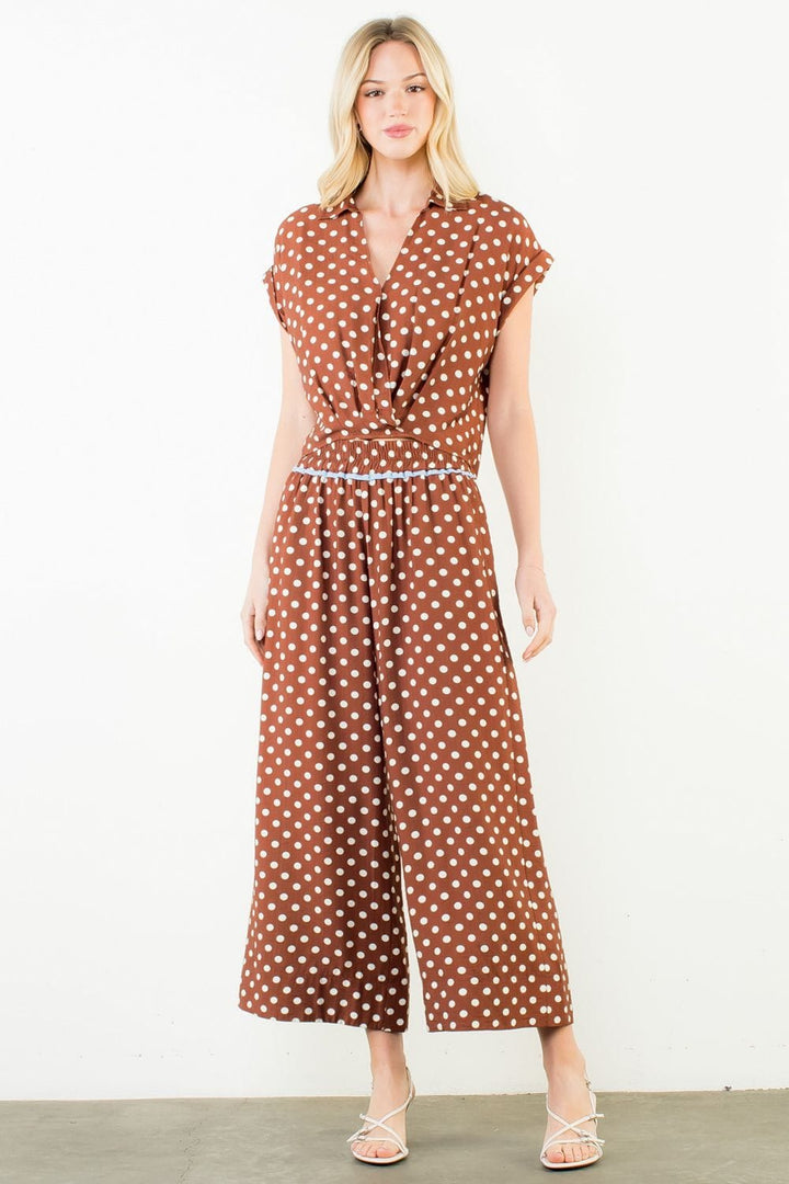 ThML Sara Polka Dot Wide Leg Pants with high waist and flowy fit, featuring black and white polka dot pattern.