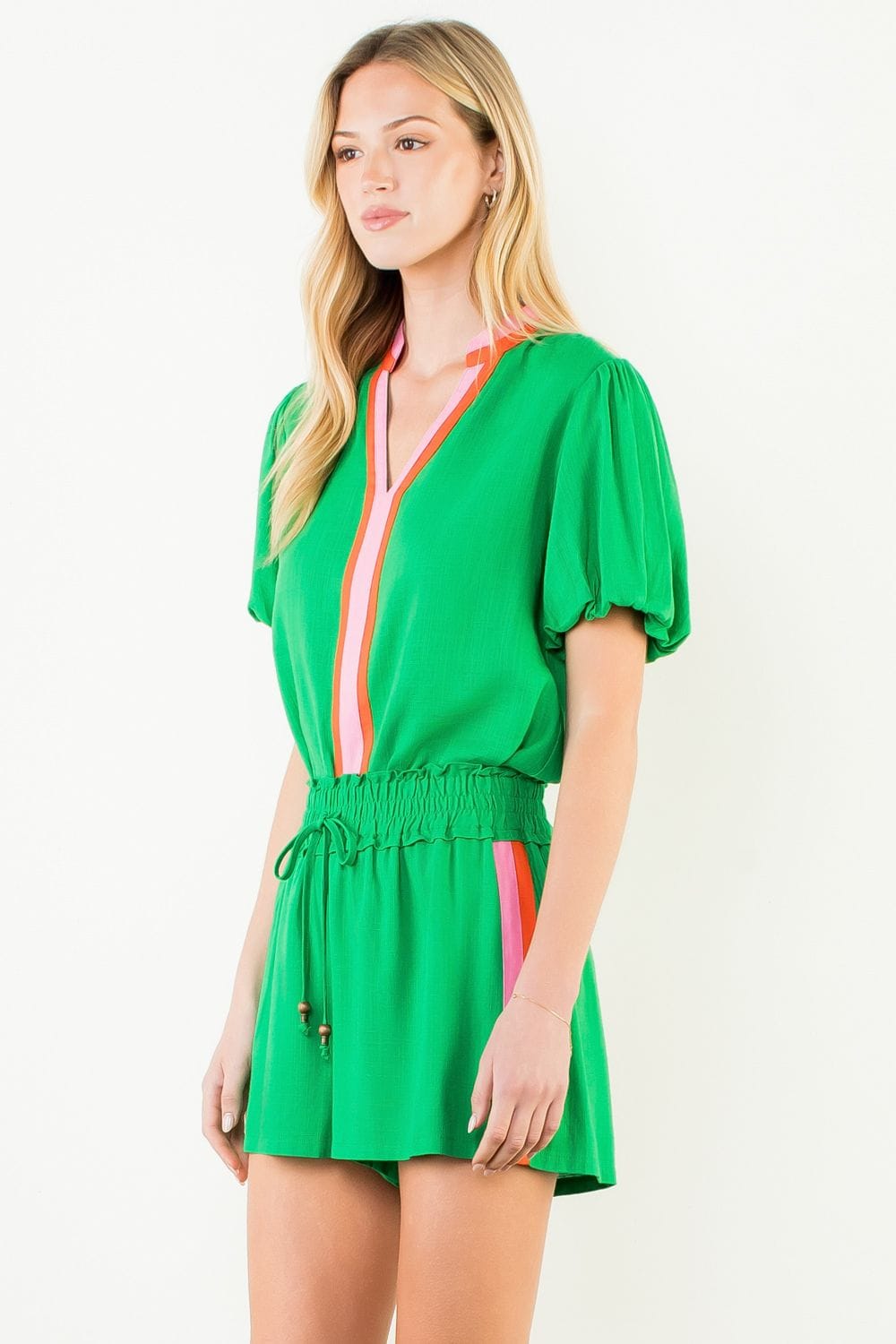 THML Kayla puff sleeve V-neck top, lightweight fabric with feminine design and stylish puff sleeves, perfect for casual wear.