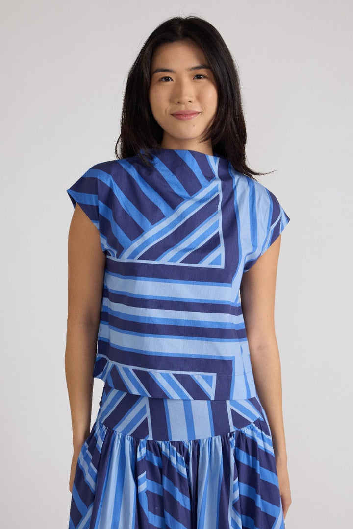 Blue geometric stripe Sadie Top by Thomas &amp; Lourdes, featuring a stylish sleeveless design and fitted silhouette.