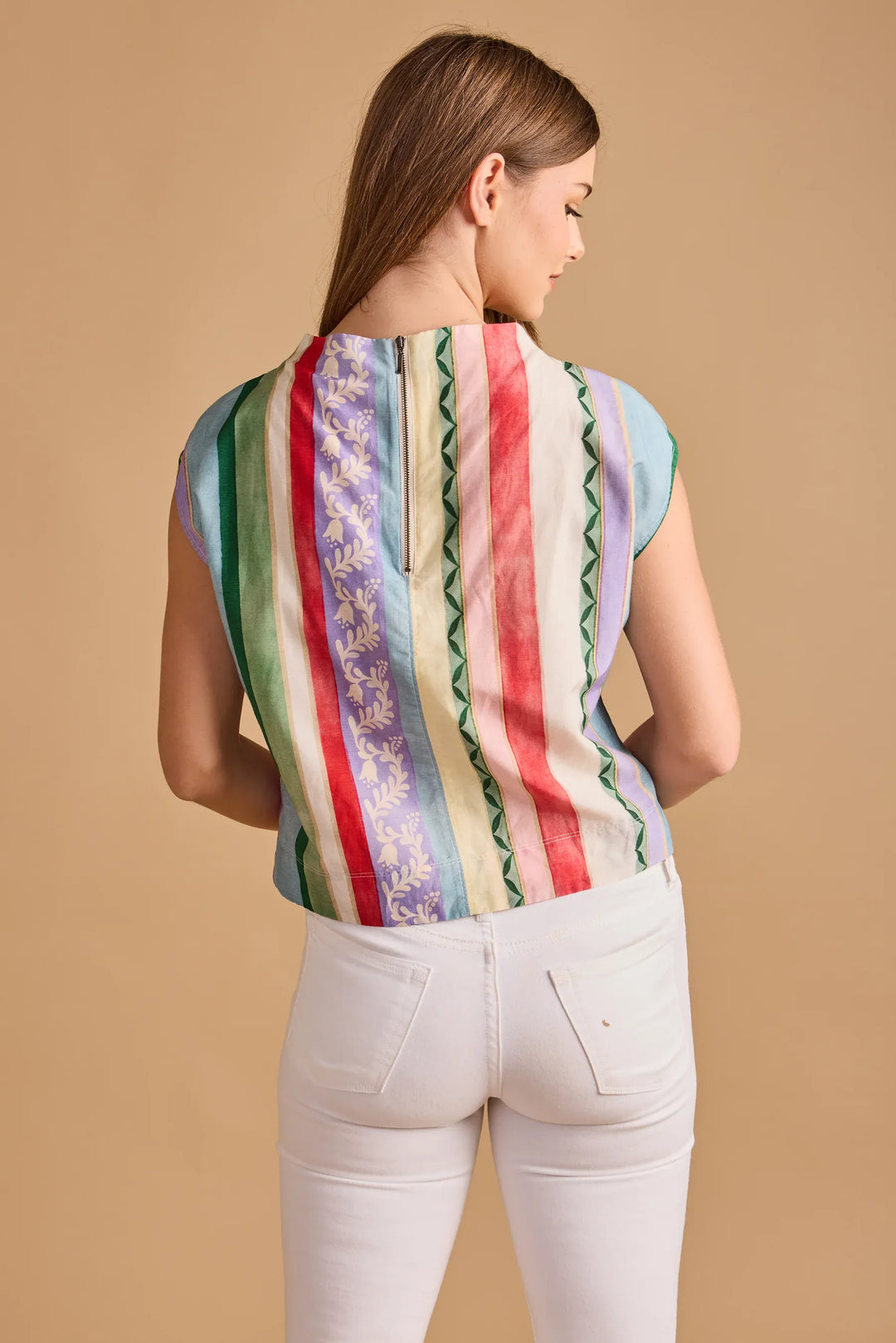 Thomas &amp; Lourdes Sadie Top featuring a stylish design with short sleeves and a relaxed fit, set against a neutral background.